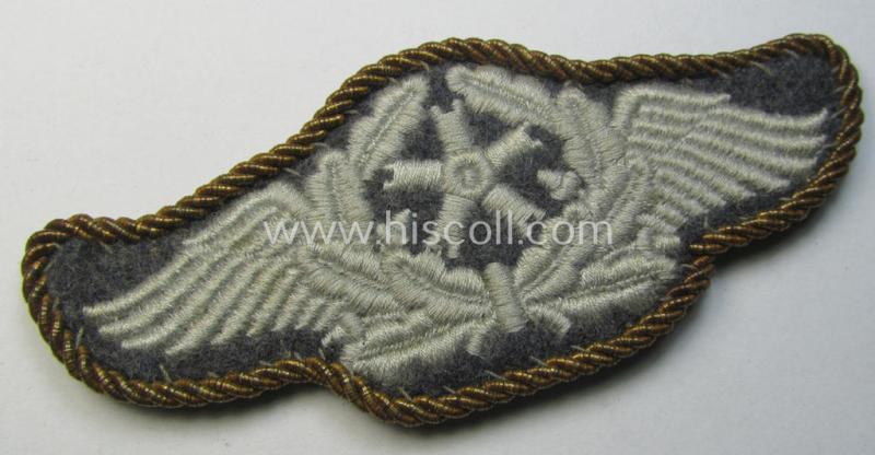 Attractive - and scarcely seen! - example of a WH (Luftwaffe) machine-embroidered, so-called: trade- ie. special-career-patch (ie. 'Tätigkeitsabzeichen') having a golden-yellow-coloured 'Goldkordel' attached as was intended for: 'Flugzeugpersonal'