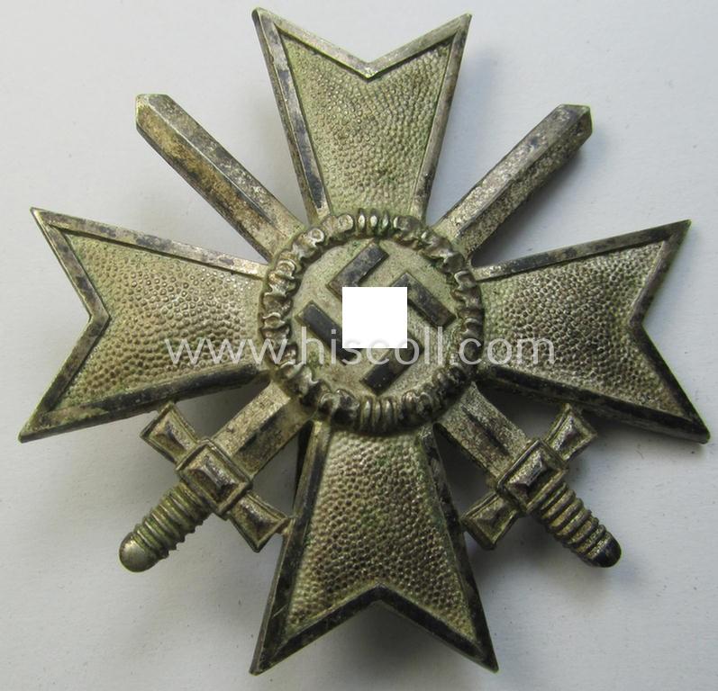 Attractive - and just moderately used- and worn! - 'Kriegsverdienstkreuz 1. Klasse mit Schwertern' being a clearly maker- (ie. '1'-) marked- and/or typical 'Buntmetall'-based specimen as was produced by the: 'Deschler u. Sohn'-company