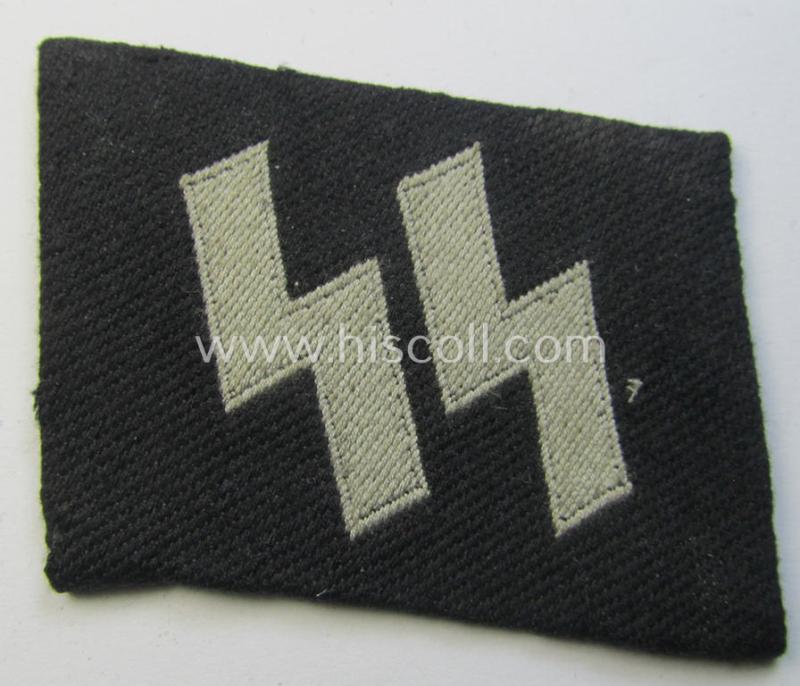 Superb - and clearly used! - Waffen-SS - so-called: 'BeVo'-woven, enlisted-mens'- (ie. NCO-) type so-called: 'runes'-collar-tab as was intended for usage by the soldiers (ie. NCOs) of the Waffen-SS throughout the war