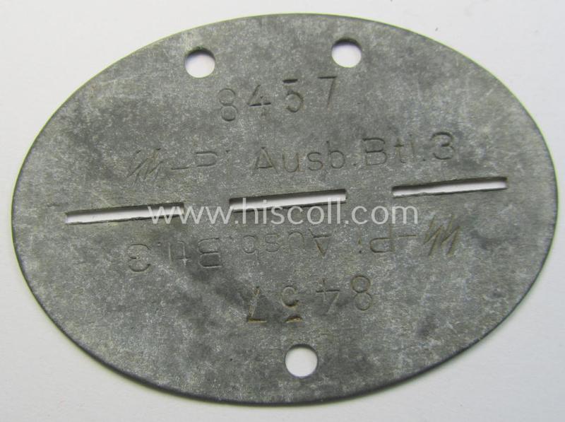 Attractive example of a greyish-coloured- and/or: typical zinc-based 'Waffen-SS'- (ie. 'SS-Pioniere'-) related ID-disc (ie.: 'Erkennungsmarke') bearing the stamped unit-designation that reads: 'SS-Pi.Ausb.Btl. 3'