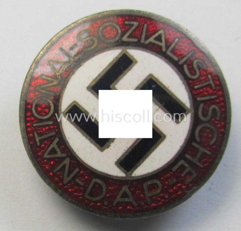 Superb - bright-red-coloured and nicely preserved! - 'N.S.D.A.P.'-membership-pin- ie. party-badge (or: 'Parteiabzeichen') which is maker-marked on its back with the makers'-designation: 'RzM' and/or: 'M1/100'