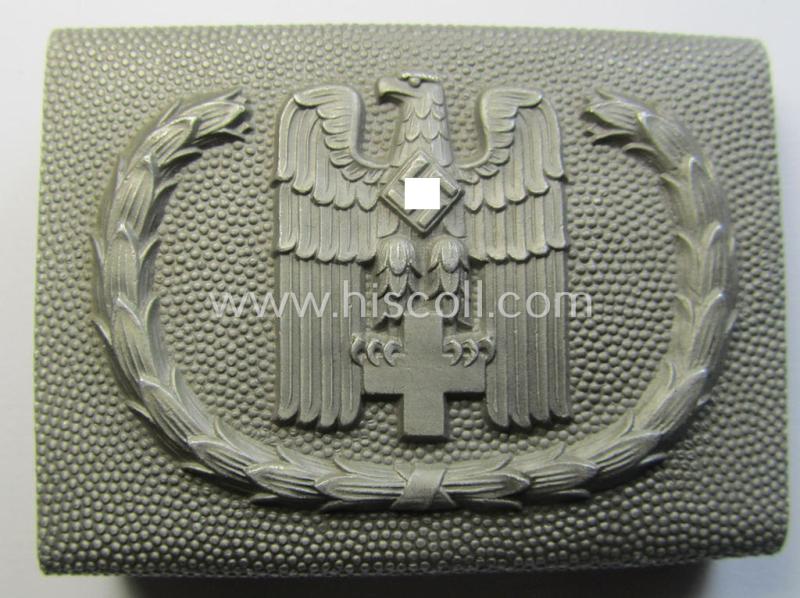 Superb, aluminium-based so-called: DRK (ie. 'Deutsches Rotes Kreuz'), EM- (ie. NCO-) type belt-buckle being a non-maker- (albeit 'Ges.Gesch.'-) marked example that comes (I deem) in a minimally worn- and/or hardly used, condition