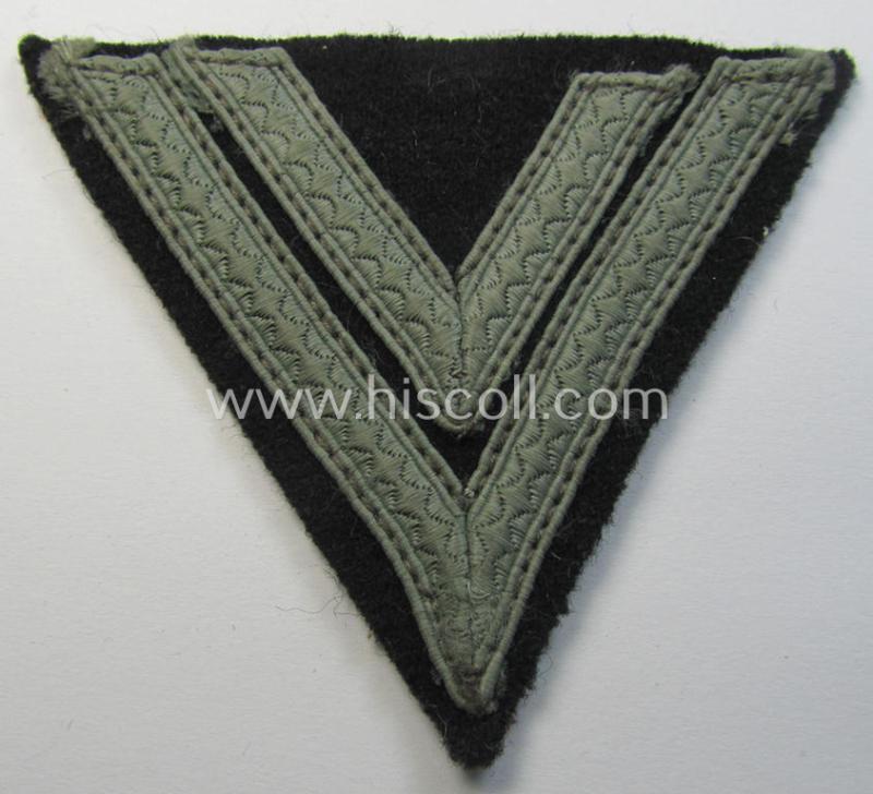 Attractive - and just moderately used! - Waffen-SS- (ie. Heeres Panzer-) type 'Armwinkel' (or: rank-chevron) as executed on black-coloured wool as was intended for an: 'SS-Rottenführer' (ie. 'Obergefreiter')