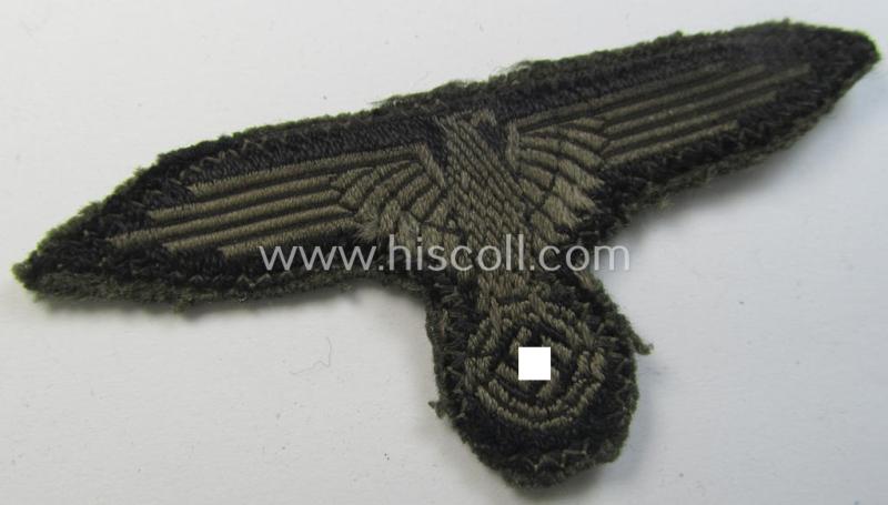 Superb - 'cut-out'- and truly worn! - Waffen-SS EM- (ie. NCO-) type woven arm-eagle (ie. 'Ärmeladler für Mannschaften u. Unterführer der Waffen-SS') as executed in the neat 'BeVo'-weave-pattern as was intended for the various SS-troops
