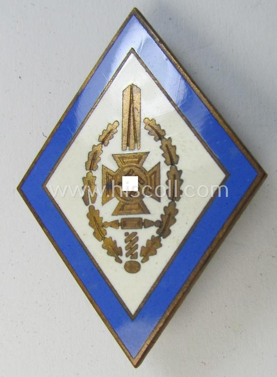 Attractive - blue-rimmed- and neatly enamelled! - honorary membership-lapel-pin (ie. 'Ehrenzeichen') as was intended for servive within the: 'Nat. Soc.  Kriegsopferversorsung' (ie. 'N.S.K.O.V.') being a maker- (ie. 'S&L'-) marked example