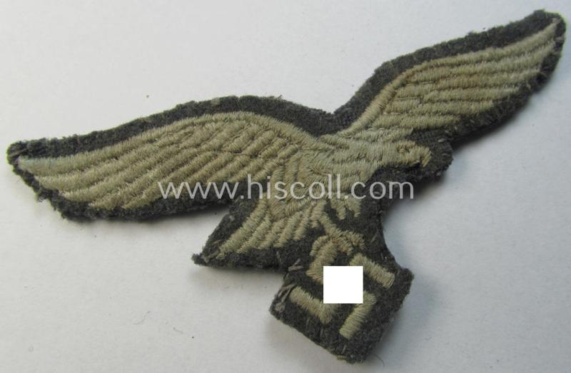 Attractive - 'cut-out'- and truly worn! - WH (Luftwaffe) EM- (ie. NCO-) type breast-eagle (ie. 'Brustadler für Mannschaften u. Uffz. der Luftwaffe') being a machine-embroidered example as was intended for the various LW-troops