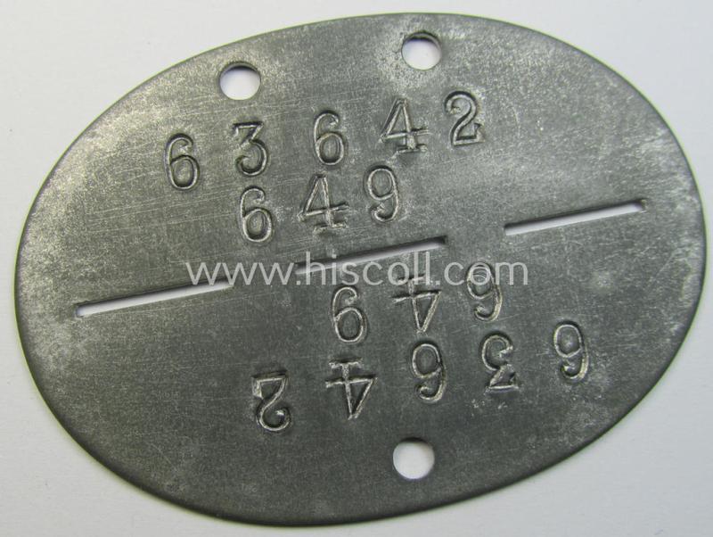 Zinc-based, WH (LW) ie. 'Flieger'-related ID-disc, bearing the clearly stamped- and/or: 'coded'-unit- ie. 'MOB'-designation that reads: '63642' (and as such belonging to a soldier who served within the: '10./Kampf-Geschwader 27' - “Boelcke”)