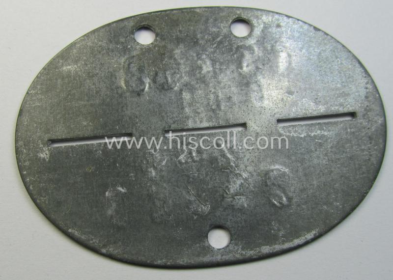 Zinc-based, WH (LW) ie. 'Flieger'-related ID-disc, bearing the clearly stamped- and/or: 'coded'-unit- ie. 'MOB'-designation that reads: '63642' (and as such belonging to a soldier who served within the: '10./Kampf-Geschwader 27' - “Boelcke”)