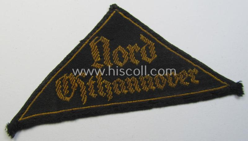 Superb - and truly rarely found! - HJ (ie. 'Hitlerjugend') district-triangle (ie. 'Gebietsdreieck') entitled: 'Nord Osthannover' (being a clearly used- ie. worn example that has lost its 'RzM-etiket' over the years)