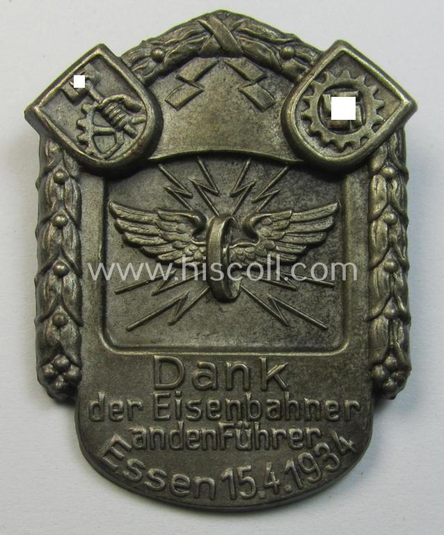 Attractive - commemorative- and/or silvered tin-based-, 'N.S.B.O.'- (ie. 'D.A.F.'-) related 'tinnie', being a non-maker marked example, showing a 'Reichsbahn'-device and text: 'Dank den Eisenbahner an den Führer - Essen 15.4.1934'