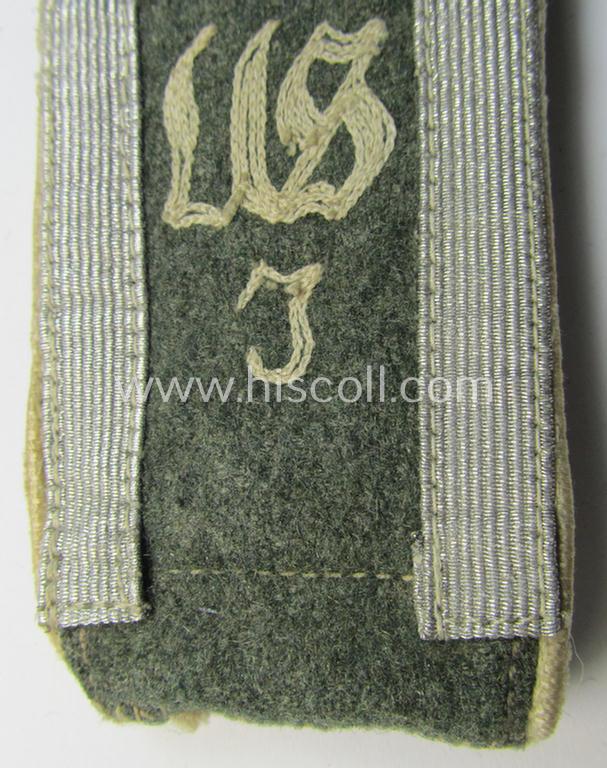 Single - albeit nevertheless rarely seen! - WH (Heeres) NCO-type, 'M40- ie. 43'-pattern- and neaty 'cyphered' shoulderstrap as was intended for usage by an: 'Unteroffizier der Inf.-Truppen u. Mitglied des Unteroffiziersschule Jülich'