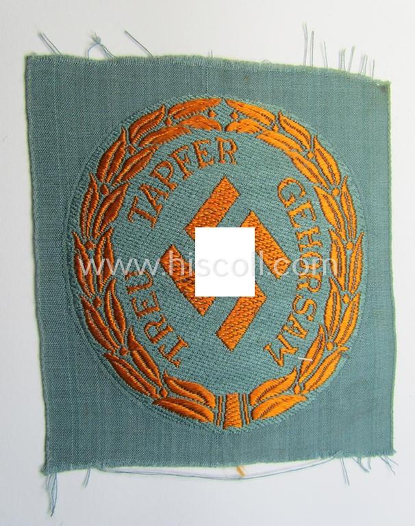 Superb - and rarely encountered! - (I deem) enlisted-mens'-type, so-called: 'Schutzmannschaften' (or: 'Schuma') armshield, as executed in bright-orange coloured thread on a (tyical police) green-coloured background