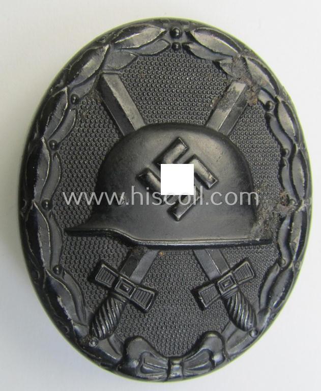 Attractive - and neatly maker- (ie. 'L/56'-) marked! - example of a black-class wound-badge (or: 'Verwundeten-Abzeichen in Schwarz') as was produced by the maker (ie. 'Hersteller'): 'Funcke & Brüninghaus'