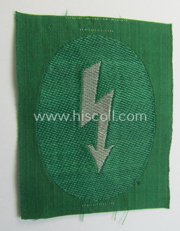 Attractive - and scarcely found! - HJ/BDM (ie. 'Hitlerjugend'/'Bund Deutscher Mädel') 'HJ-Nachrichten-Leistungsabzeichen' showing a silver-toned 'signal-blitz' on a green-toned background as was intended to signify succesion in the: 'B-Prüfung'