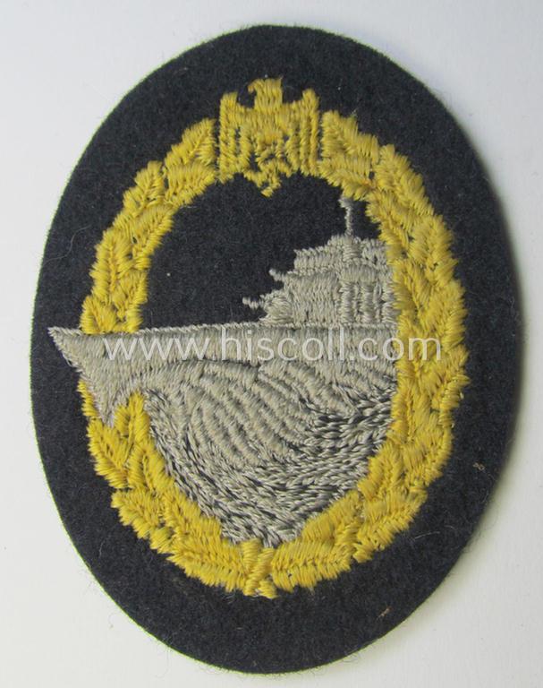 Attractive, WH (Kriegsmarine) 'Zerstörerkriegsabzeichen in Stoff' (ie. cloth-based destroyer war-badge) being a multi-coloured example that that is nicely machine-embroidered on darker-blue-coloured wool