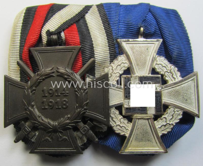 Two-pieced medal-bar (ie. 'Doppelspange') respectively depicting a WWI-period: 'Frontkämpferkreuz 1914-18' (ie.: 'Kriegsteilnehmerkreuz mit Schwertern') and a: 'Treuedienst Ehrenzeichen 2. Klasse'