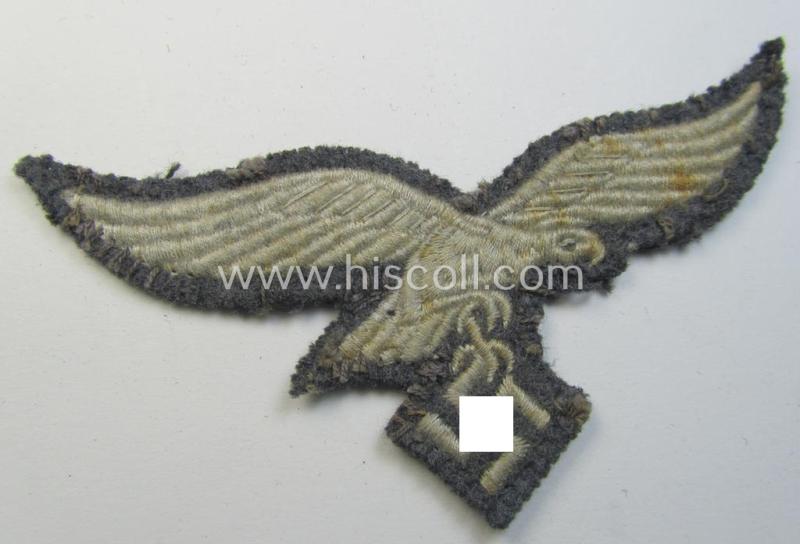 Attractive - truly worn and carefully tunic-removed! - WH (Luftwaffe) EM- (ie. NCO-) type breast-eagle (ie. 'Brustadler für Mannschaften u. Uffz. der Luftwaffe') being a machine-embroidered example as was intended for the various LW-troops