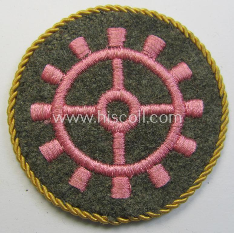 WH (Heeres ie. 'Panzer'-) trade- ie. special-career-patch having a golden-yellow-coloured 'Kordel' (ie. 'Umrandung') attached as was intended for a: 'Panzerwarte o. Kfz.-Warte o. Handwerker' (aka 'KFZ-Technisches Personal')