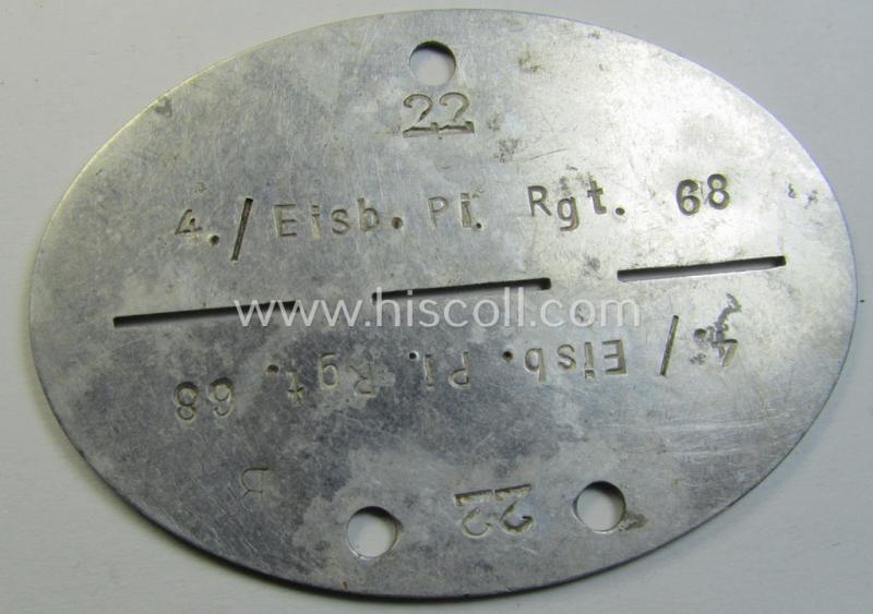 Aluminium-based, WH (Heeres) 'Eisenbahn-Pioniere'- (ie. railway-engineers-) related ID-disc bearing the clearly stamped unit-designation that reads: '4./Eisb.Pi.Rgt. 68' and that comes as issued- and/or worn