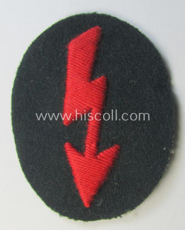 WH (Heeres) trade- and/or special-career-insignia ie. hand-embroidered 'signal-blitz' being a nicely maker- (ie. 'H&W'-) marked example as executed in bright-red linnen as was specifically intended for a soldier within the: 'Artillerie-Truppen'