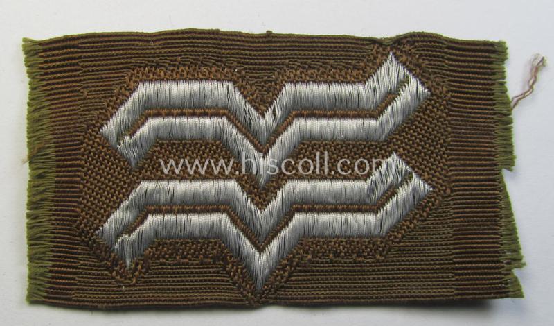 Attractive - and actually scarcely seen! - single example of an OT- (ie.: 'Organisation Todt'-) related golden-brown-coloured, enlisted-mens'- (ie. NCO-) pattern collar-patch (ie. 'OT-Dienstgraden-Abzeichen') as intended for an: 'Oberfrontführer'