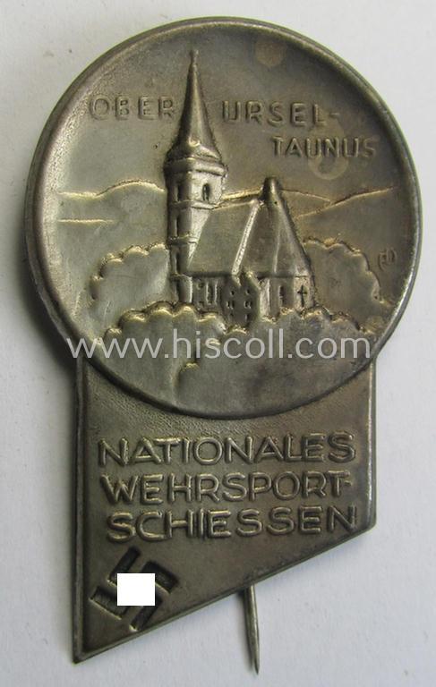 Commemorative, silver-coloured, N.S.D.A.P.-related 'tinnie' being a non-maker-marked example depicting a city-view coupled with a swastika and text: 'Oberursel - Taunus - Nationales Wehrsport-Schiessen'
