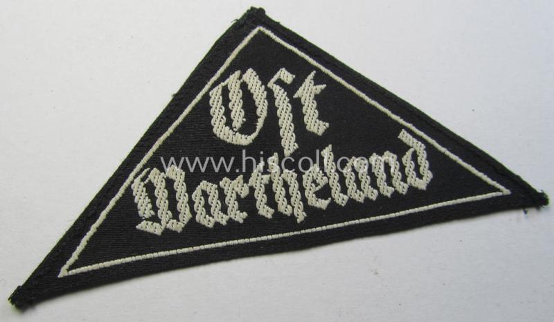 Stunning - and extremely rarely encountered! - HJ ('Hitlerjugend') ie. BDM (or: 'Bund Deutscher Mädel') district-triangle (ie. 'Gebietsdreieck') entitled: 'Ost Wartheland'