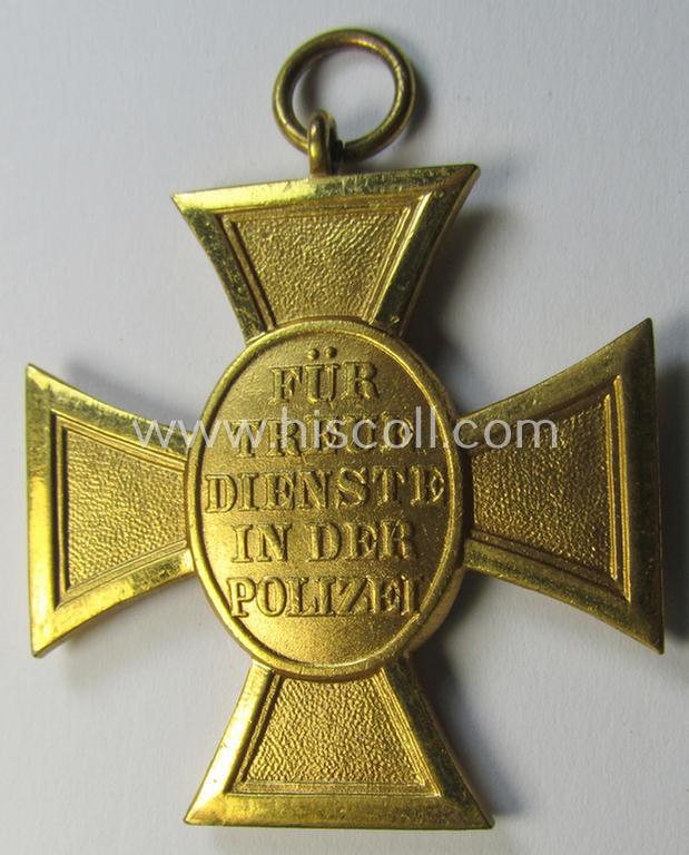 Attractive, golden-class 'Pol.-Dienstauszeichnung 1. Stufe' (or: police loyal-service medal first-class) that comes stored in its period, green-coloured (and luxuriously styled!) etui and that comes with its accompanying ribbon (ie. 'Bandabschnitt')
