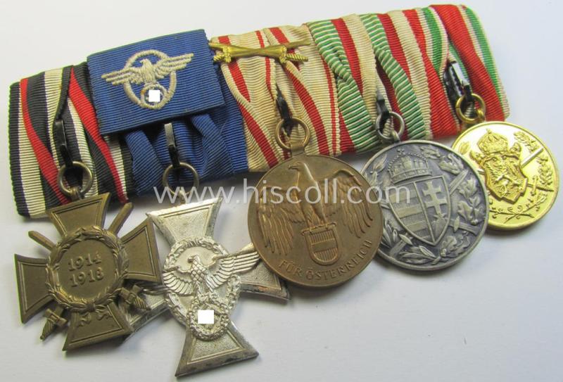 Superb, 5-pieced WWI- (ie. TR-) related medal-bar (ie. 'Ordenspange') resp. depicting an: 'FKK 1914-18 mit Schw.', a: 'Polizei-Dienstauszeichnung 2. Stufe' (or: police loyal-service medal 2nd class) and three Austrian WWI commemorative medals