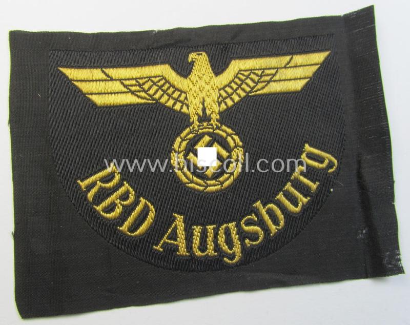 Neat, RB- ('Reichsbahn'-) related arm-eagle as executed in 'BeVo'-weave style as was intended for an official of the: 'Deutsche Reichsbahn' ie. the 'RBD Augsburg' (or: 'Reichsbahndirektion Augsburg')