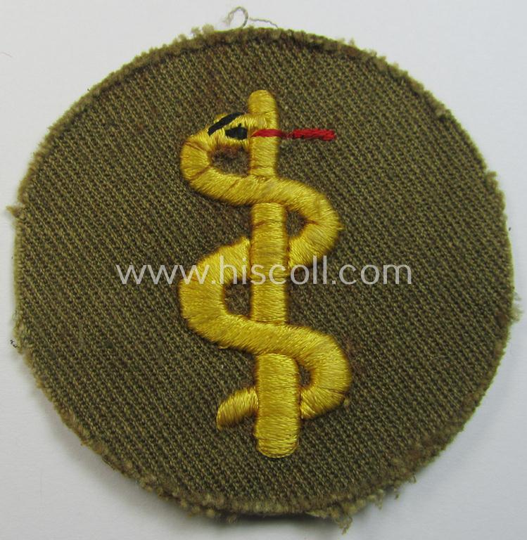 Neat, WH (Heeres) 'tropical'-issue, trade- and/or special-career insignia (ie. machine-embroidered 'Laufbahn- o. Tätigkeitsabzeichen') as was intended for an army: 'Sanitäter' (or: medical-orderly ie. NCO)