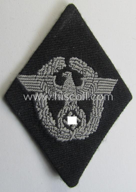 Superb, Waffen-SS-pattern, neatly 'BeVo'-woven and/or black-coloured sleeve-insignia (ie. 'Ärmelraute') depicting a so-called: 'Polizeiadler' as was used and intended to signify former membership within the: 'Polizei'