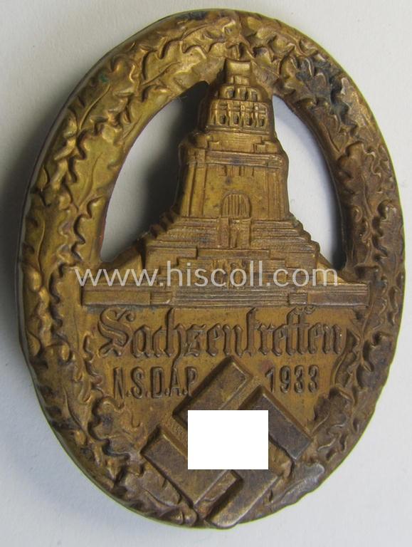 Commemorative, tin-based- and/or: bright-golden-coloured, early-period N.S.D.A.P.-related 'tinnie' being a non-maker marked example depicting the 'Kyfhäuser'-monument and 'swastika'-device and bearing the text: 'Sachsentreffen N.S.D.A.P. 1933'