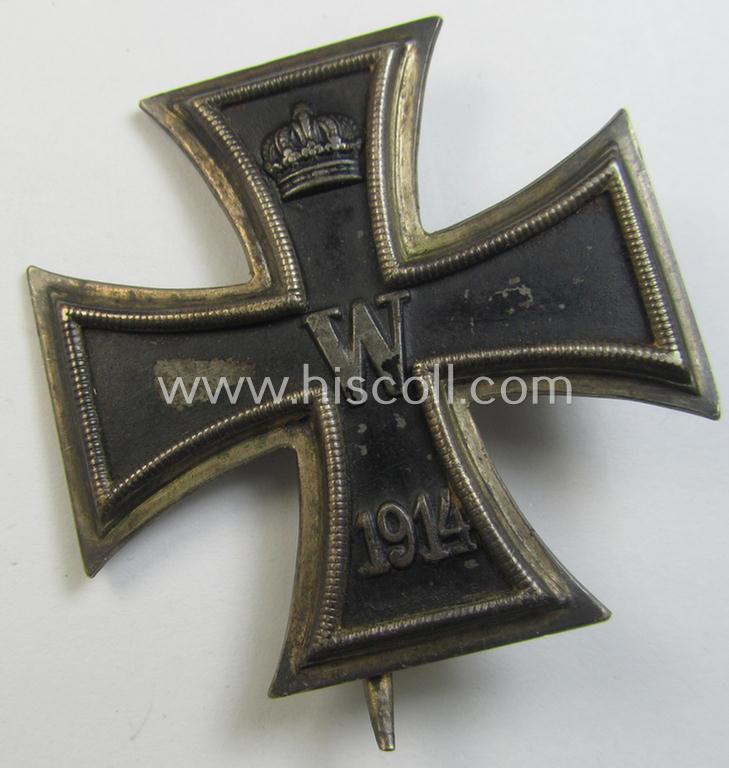 Attractive - and just moderately used - WWI-period Iron Cross 1st class (or: 'Eisernes Kreuz 1. Klasse') being a nicely preserved- and typical non-converse-shaped example that shows the makers'-designation: 'KO' stamped onto its back
