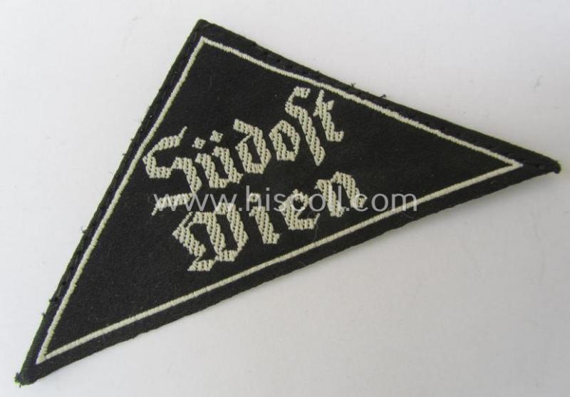 'HJ' ('Hitlerjugend') ie. 'BDM'- ('Bund Deutscher Mädel') district-triangle (ie. 'Gebietsdreieck') entitled: 'Südost Wien' (being a hardly used- nor worn example that still retains its period-attached 'RzM'-etiket)