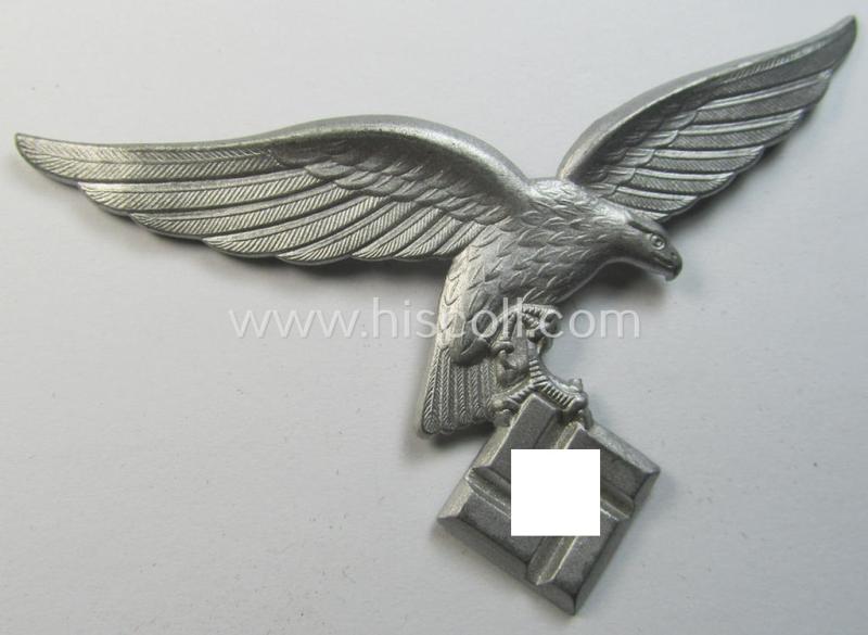 Attractive, silverish-grey-coloured- (and I deem tin-based) WH (Luftwaffe) related so-called: 'photo-album-device' depicting a detailed ('down-tailed'-pattern!) eagle-device and being a non-maker-marked example