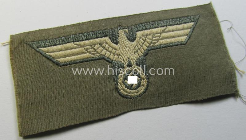 Attractive, WH (Heeres) - very early- ie. pre-war-period! - white-coloured side-cap-eagle (ie. 'Schiffchenadler für Mannschaften u. Uffz.') as was executed in the neat 'BeVo'-weave pattern on a greyish- ie. bluish-green-coloured background