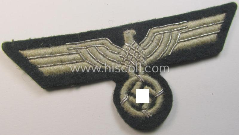 Neat - and moderately used! - WH (Heeres) officers'-type, machine-embroidered breast-eagle (ie. 'Brustadler für Offiziere') as was executed in greyish-silver-coloured linnen as was intended for usage on the various officers'-pattern tunics