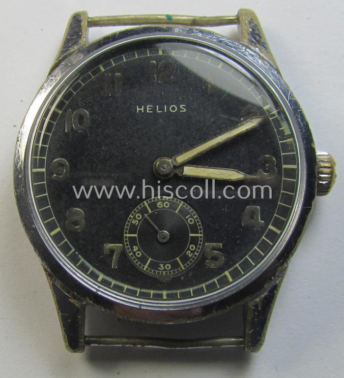 Neat - and scarcely encountered! - WH (Heeres, LW etc.) WWII-period wrist-watch (or: 'Dienstuhr') of the make: 'Helios' having an engraved number: 'D26525H' on its back (and that comes in a non-running condition)