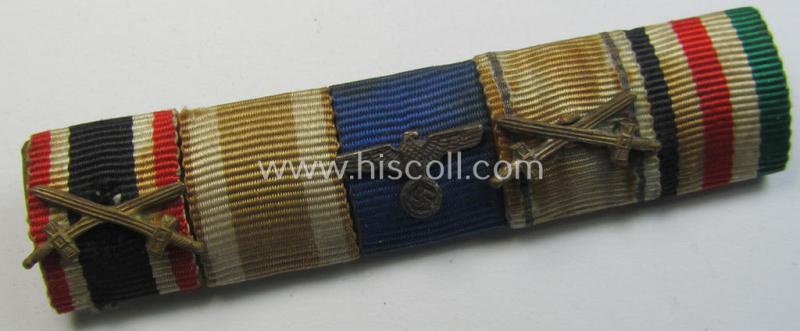 5-pieced WH (Heeres o. KM) medal-bar (ie. 'Feld- o. Bandspange') showing resp. the ribbons for a: 'KvK II. Kl. m. S.', a: 'Westwall'-medal, a: WH (Heeres o. KM) DA 4. St., a: Bulgarian medal: 'Za Chabrost' and a: 'Deu.-Ital. Feldzugsmedaille'