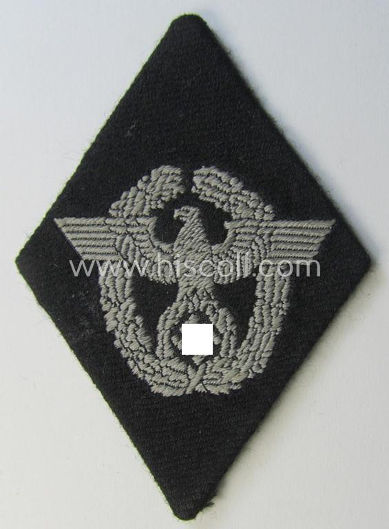 Superb, Waffen-SS-pattern, neatly 'BeVo'-woven and/or black-coloured sleeve-insignia (ie. 'Ärmelraute') depicting a so-called: 'Polizeiadler' as was used and intended to signify former membership within the: 'Polizei'
