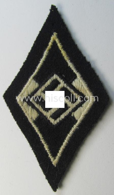 Waffen-SS-pattern, machine-embroidered and/or black- and white-coloured sleeve-insignia (ie. 'Ärmelraute') depicting a so-called: 'HJ-Raute' as was used and intended to signify former membership within the 'Hitlerjugend'