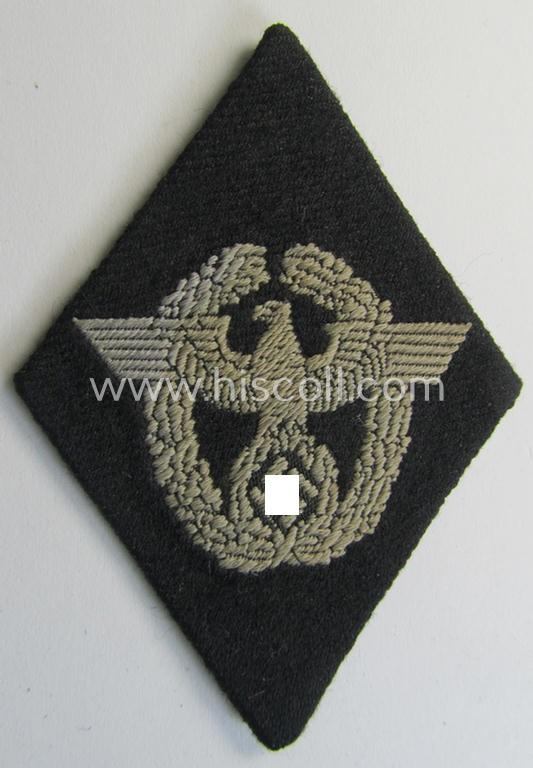 Superb, Waffen-SS-pattern, neatly 'BeVo'-woven and/or black-coloured sleeve-insignia (ie. 'Ärmelraute') depicting a so-called: 'Polizeiadler' as was used and intended to signify former membership within the: 'Polizei'