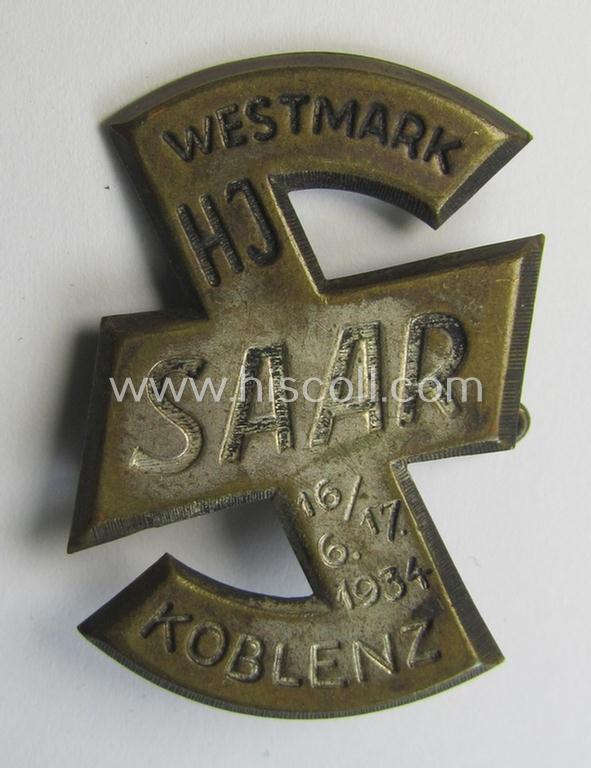 Attractive - and scarcely encountered! - HJ- (ie.'Hitlerjugend'-) related 'tinnie' being a non-maker-marked example showing a (stylised- ie. rounded) 'Wolfshook'-insignia and text that reads: 'HJ Saar - Westmark - Koblenz - 16./17.6.1934'