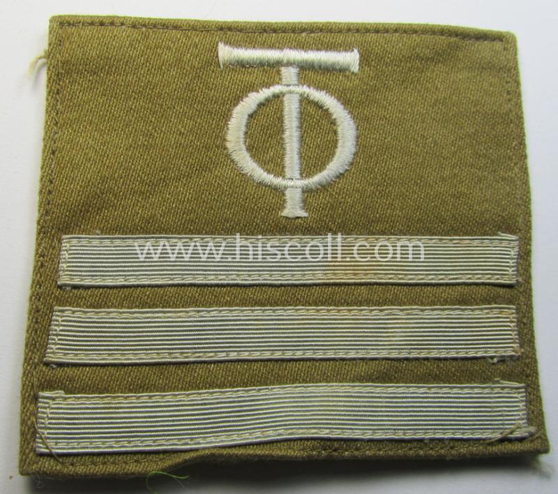 Attractive - and actually scarcely seen! - single example of an OT- (ie.: 'Organisation Todt'-) related golden-brown-coloured, (I deem) officers'-pattern rank-patch (ie. 'OT-Dienstgraden-Abzeichen')