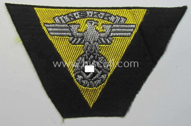 Attractive, so-called: N.S.K.K. (ie. 'National Socialistisches Kraftfahr Korps') side-cap-eagle (ie. 'Adler für N.S.K.K.-Schiffchen o. Lagermütze') being a 'flat-wire-woven'-example onto a bright-yellow-coloured background