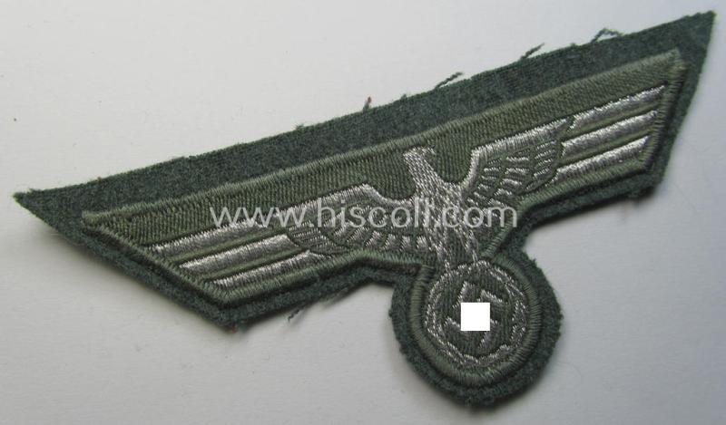 WH (Heeres) breast-eagle as executed in 'BeVo'-type-, so-called: 'flat-wire'-weave-pattern and pre-mounted on field-grey-coloured wool as was specifically intended for usage by soldiers (ie. NCOs) on their dress-tunics (ie. 'Waffenröcke')