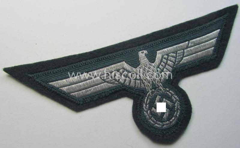 WH (Heeres) breast-eagle as executed in 'BeVo'-type-, so-called: 'flat-wire'-weave-pattern and pre-mounted on darker-green-coloured wool as was specifically intended for usage by soldiers (ie. NCOs) on their dress-tunics (ie. 'Waffenröcke')