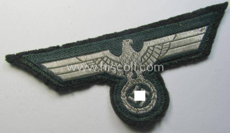 WH (Heeres) breast-eagle as executed in 'BeVo'-type-, so-called: 'flat-wire'-weave-pattern and pre-mounted on darker-green-coloured wool as was specifically intended for usage by soldiers (ie. NCOs) on their dress-tunics (ie. 'Waffenröcke')
