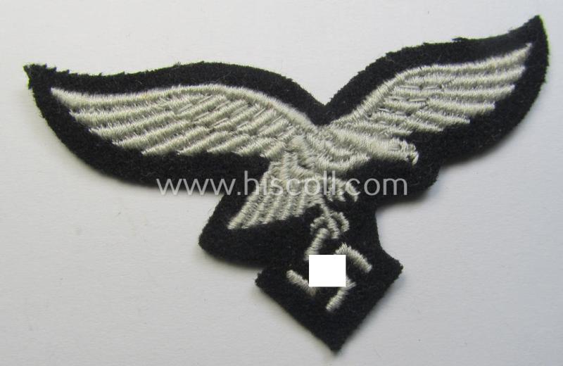 Attractive, WH (Luftwaffe) cap-eagle (being a 'standard-issue'-pattern example that is executed on a black-coloured background and that was as such intended for usage on the black-coloured work- ie. 'HG'-related side-caps ie. 'Schiffchen')